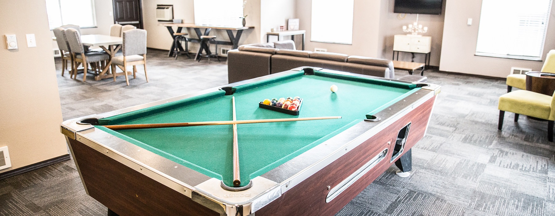 game room with billiards table and couch